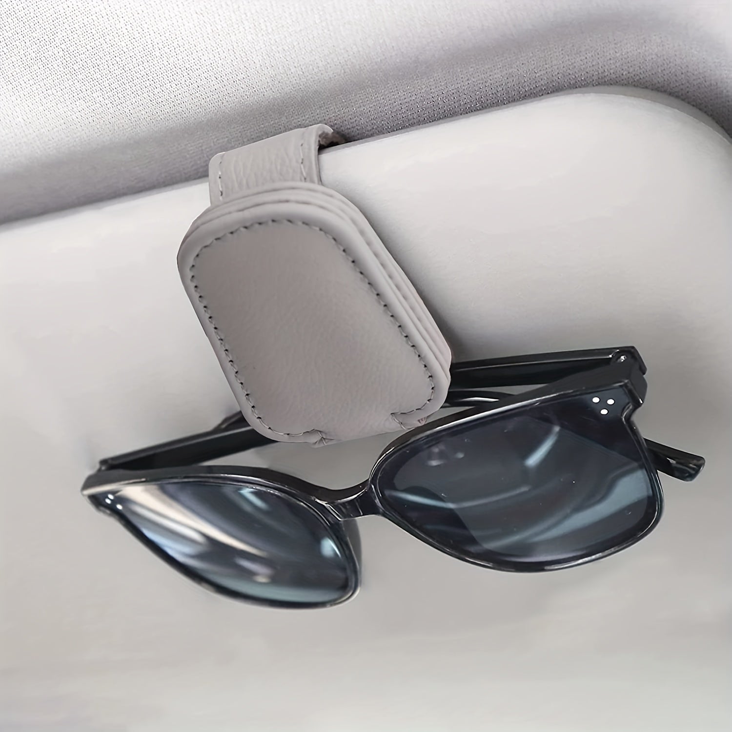 Sunglasses holders for the car