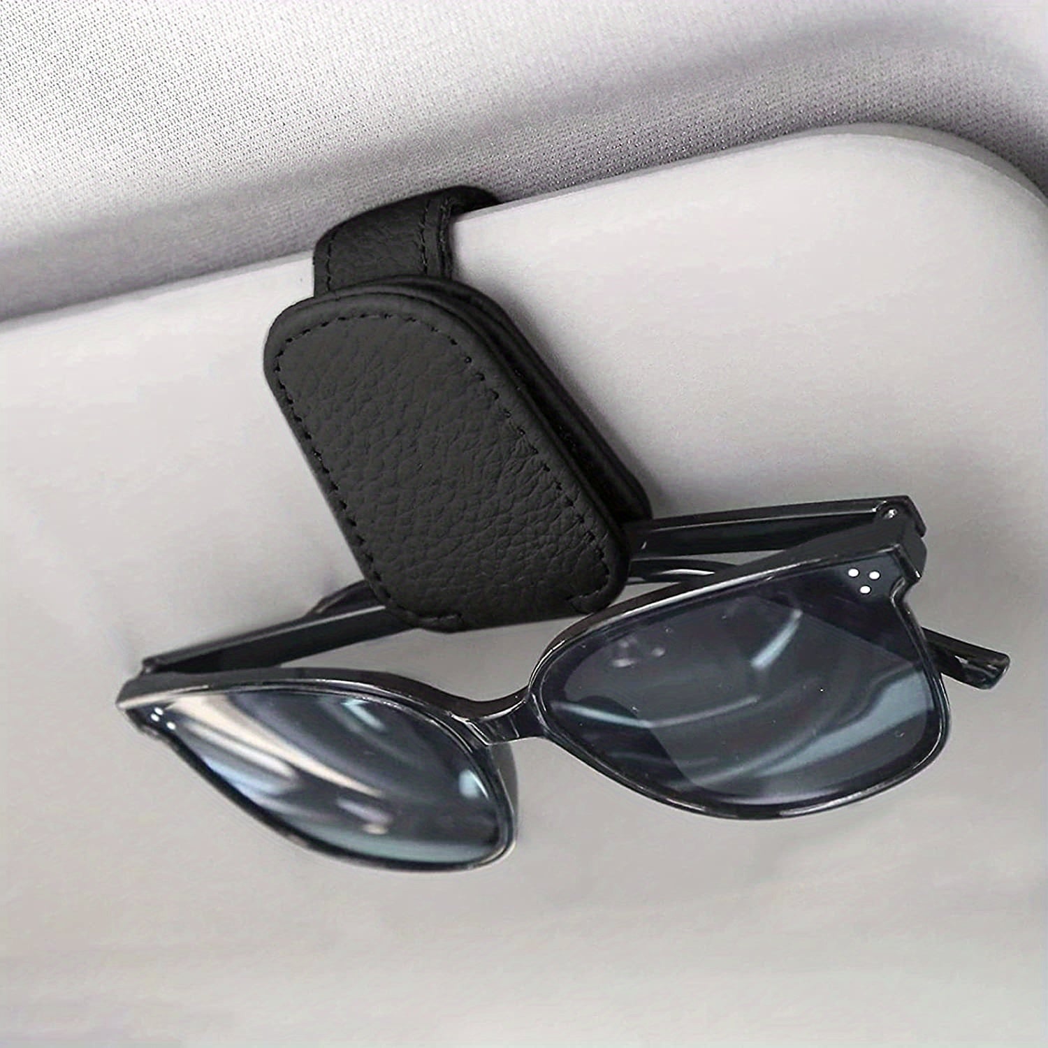 Sunglasses holders for the car